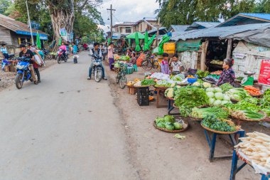 HSIPAW, MYANMAR - DECEMBER 2, 2016: View of a vegetable market in Hsipaw, Myanmar clipart