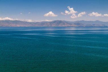 Mountains and lake Sevan in Armenia clipart