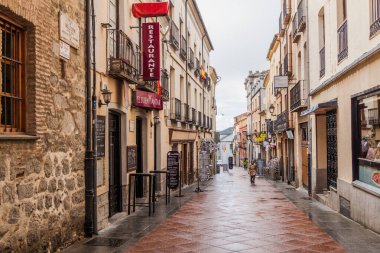 AVILA, SPAIN - OCTOBER 19, 2017: Narrow alley in the historic center of Avila.