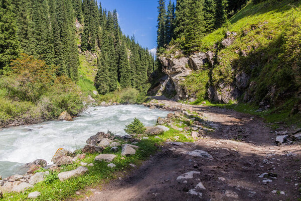 Rough road in Arashan river valley in Kyrgyzstan