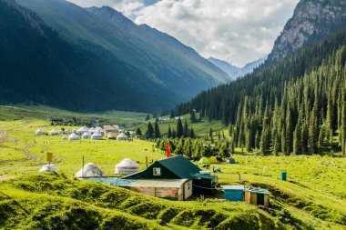 Yurt camps in Altyn Arashan village, Kyrgyzstan clipart