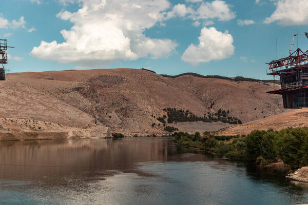 Construction of a bridge over Euphrates (Firat) river under the Ataturk dam, Turkey