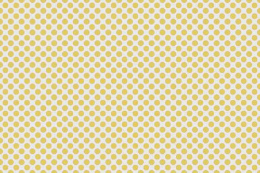 Sarı puantiyeli sarma kağıdı tasarım için kağıt dokusu ile gri arka plan üzerinde