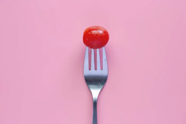 Fresh Red Tomato Fork Pink Background Diet Heathy Eating Concept — Stock Photo, Image