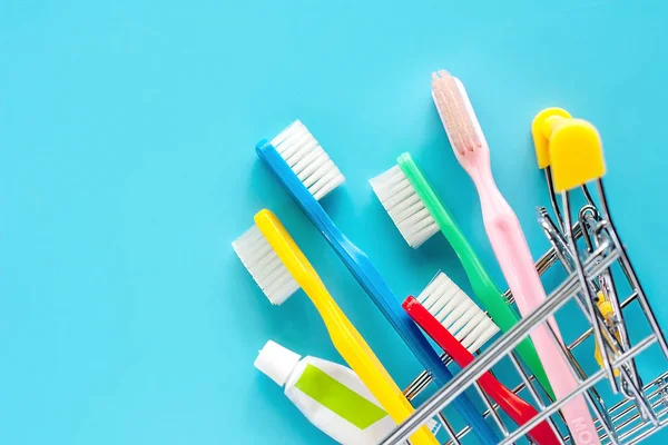 Shopping Cart Toothbrush Toothpaste Blue Background Market Dental Care Concept — Stock Photo, Image