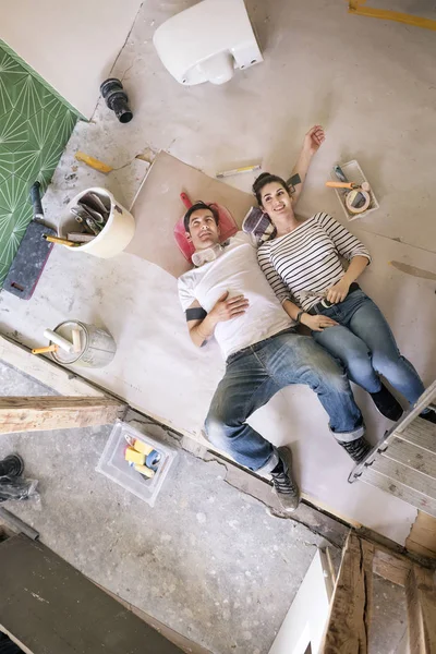 Happy Couple Renovating New Home Taking Break Daydreaming — Stock Photo, Image