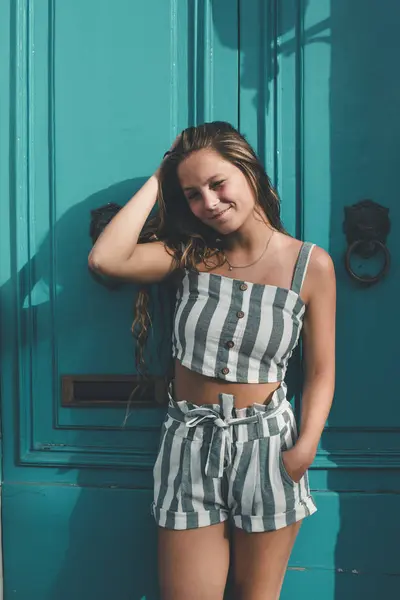 Teenage Girl Wearing Striped Beach Wear Posing Front Blue Door — Stock Photo, Image