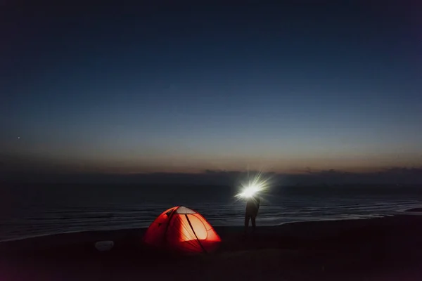 Silhouette Man Camping Beach Using Flashlight — Stock Photo, Image
