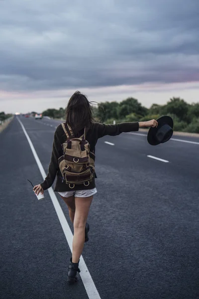 Back View Hitchhiking Young Woman Backpack Beverage Standing Side Line — Stock Photo, Image