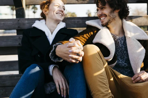 Happy Couple Sitting Holding Hands — Stock Photo, Image
