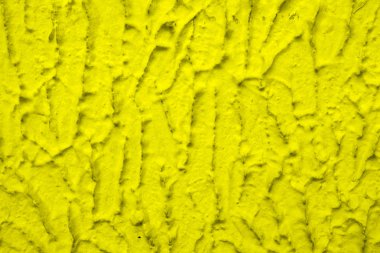 Sarı beton duvar pürüzlü.