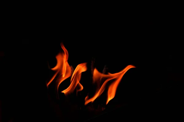 特写火火焰抽象在黑色背景 — 图库照片