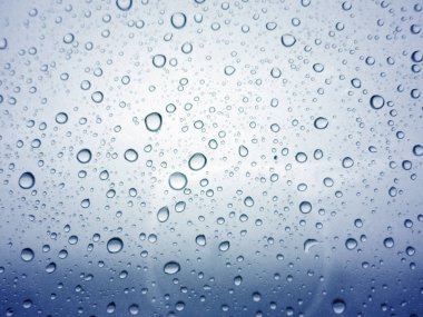 Mavi arka planda su damlacıkları dokusu