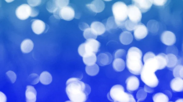 Abstract blauw bokeh, Kerstmis en Nieuwjaar thema achtergrond — Stockfoto