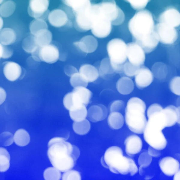 Abstrakte blaue Bokeh, Weihnachten und Neujahr Thema Hintergrund — Stockfoto
