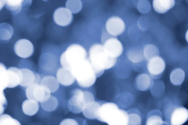 Abstract blauw bokeh, Kerstmis en Nieuwjaar thema achtergrond — Stockfoto