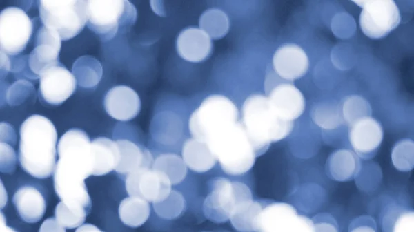 Abstract blauw bokeh, Kerstmis en Nieuwjaar thema achtergrond — Stockfoto