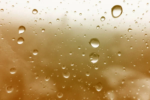Water droplets texture on brown background — Stock Photo, Image