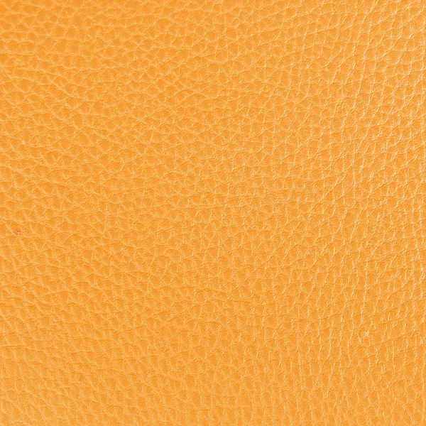 Fundo de couro amarelo textura close-up — Fotografia de Stock