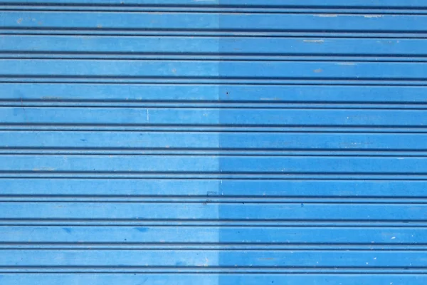 Cink lemez kék háttér közelről — Stock Fotó