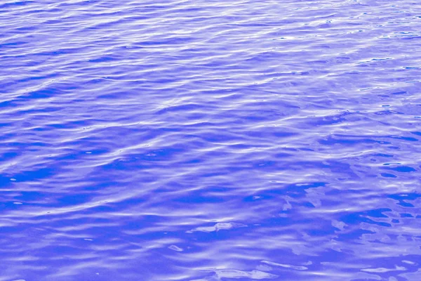 Azul água abstrato fundo close-up — Fotografia de Stock