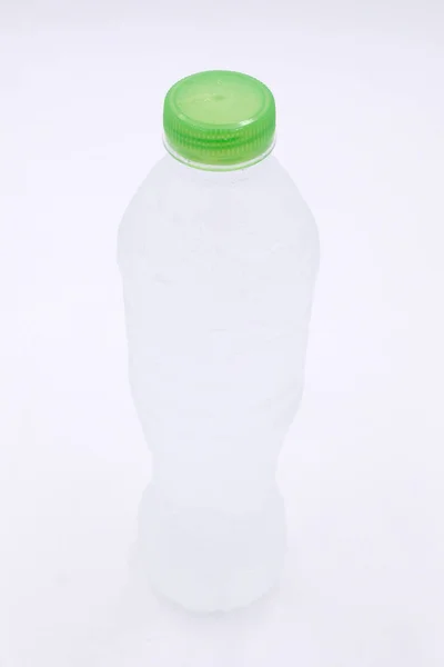 Water drink plastic bottle on white background — Stock Photo, Image