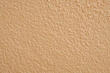 Kahverengi çimento duvar arka plan yakın çekim