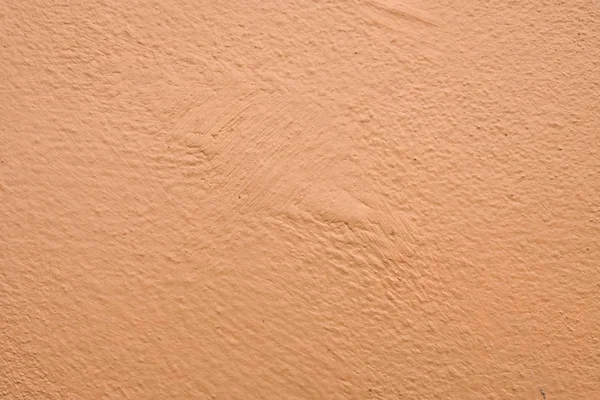 Fondo de la pared de cemento marrón de cerca — Foto de Stock