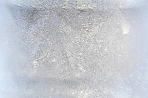 Vattendroppar textur på grå bakgrund — Stockfoto