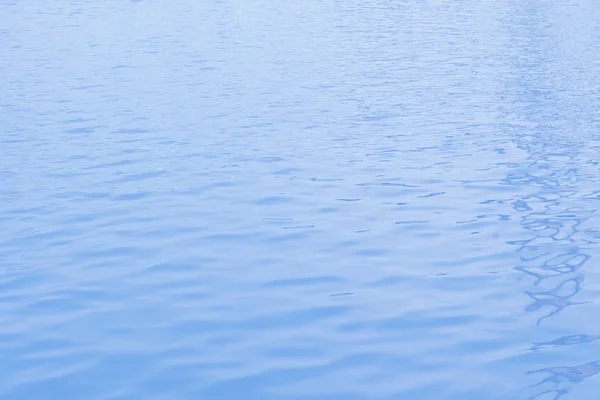Close up oceano fundo de água, azul água ondulações textura — Fotografia de Stock