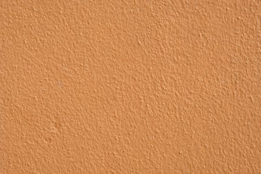 Kahverengi çimento duvar arka plan yakın çekim