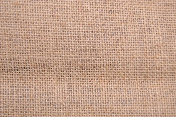 Закрыть коричневую текстуру мешковины — стоковое фото