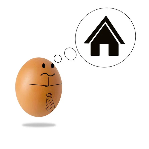 Ev ile düşünen işadamı yumurta — Stok fotoğraf