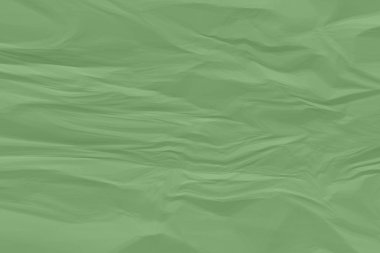 Buruşmuş yeşil kağıt arkaplanı kapat