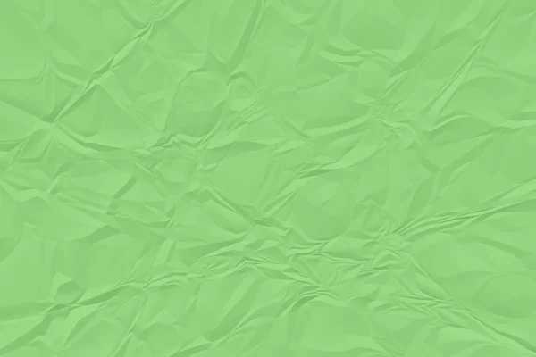 Crumpled green paper fundo close up — Fotografia de Stock