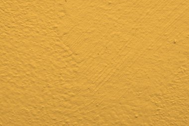 Katı sarı beton desenli duvar