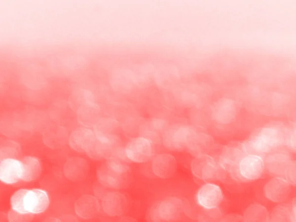 红色和粉色模糊了焦距的Bokeh背景 圣诞节和新年的概念 — 图库照片