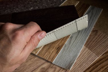 Muşamba. Ahşap doku ile döşeme örnekleri. Kesim boyutu. Yeni yıl.