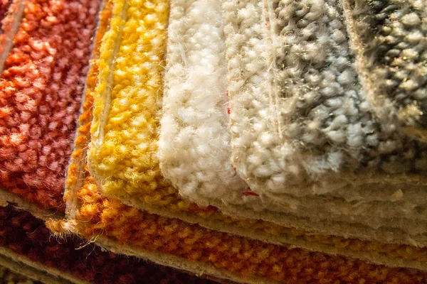 Carpet. Samples of carpet for laying on the floor in the room. Examples