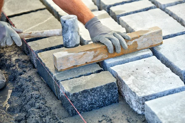 Workman Gloved Hands Use Hammer Place Stone Pavers Worker Creating Royalty Free Stock Images