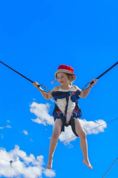 Children Jumping Trampoline Rubber Ropes Blue Sky Adventure Extreme Sports — Stock Photo, Image