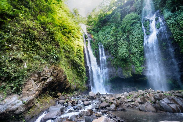 Purity of the nature. Panorama view of a high tropical waterfall