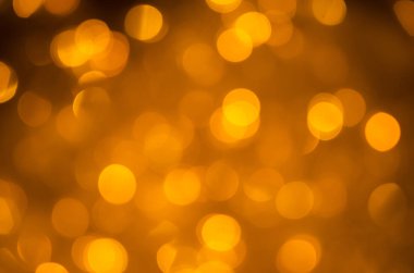 Şenlik arka planı. Bokeh 'in sarı arka planı. Arka plan bulanık. Soyut çemberler.