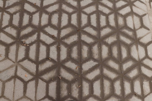 Grey square pavement tiles. Texture background.