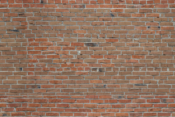 Red brick. The texture of the masonry.