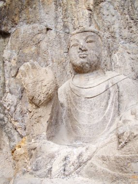 Luoyang Longmen mağaraları. Kırık Buda ve taş mağaralar ve 