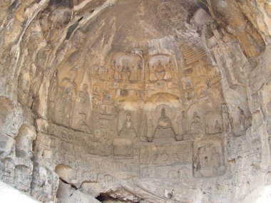 Luoyang Longmen mağaraları. Kırık Buda ve taş mağaralar ve 