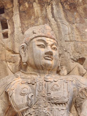 Luoyang Longmen mağaraları. Kırık Buda ve taş mağaralar ve 