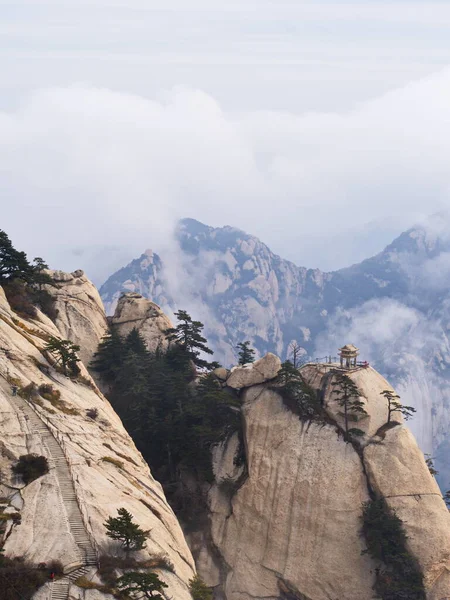 Huashan Mountain near Xian City. The Most dangerous Trail and Crowned People in China. Mount Hua is one of the Five Great Mountains of China in Huayin City, Shaanxi Province, China, 18th October 2018.