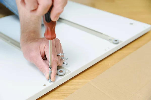 Man Installing Joint Connector Bolts Furniture Board — Stock Photo, Image